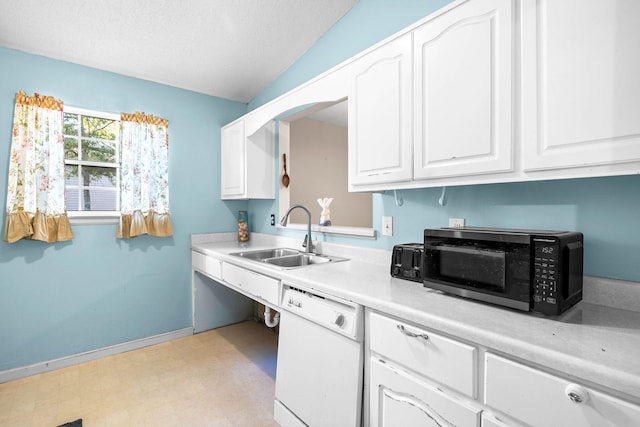 321 Timber Wind Dr, Defuniak Springs, FL 32433 - kitchen featuring white dishwasher, black microwave, white cabinets, light flooring, and light countertops