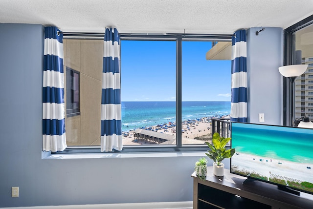 9850 S Thomas Dr Unit 1012W, Panama City, FL 32408 - bedroom with a textured ceiling