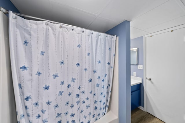 9850 S Thomas Dr Unit 1012W, Panama City, FL 32408 - full bathroom featuring vanity and wood finished floors