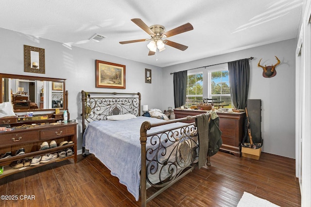 1069 Caswell Rd, Defuniak Springs, FL 32433 - bedroom with wood finished floors and a ceiling fan