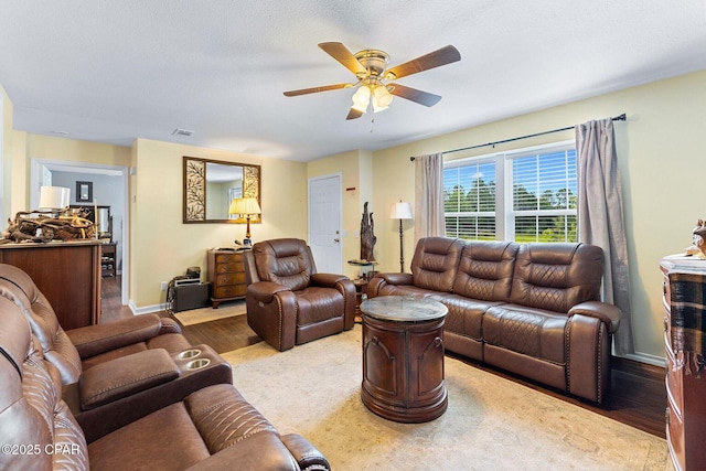 1069 Caswell Rd, Defuniak Springs, FL 32433 - living area with a ceiling fan and wood finished floors