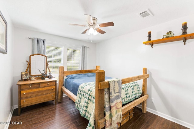 1069 Caswell Rd, Defuniak Springs, FL 32433 - bedroom with wood finished floors and ceiling fan