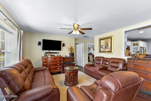 1069 Caswell Rd, Defuniak Springs, FL 32433 - living room with wood finished floors and a ceiling fan