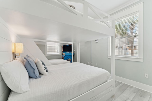 30 Los Angeles St, Miramar Beach, FL 32550 - bedroom with wood finished floors and baseboards