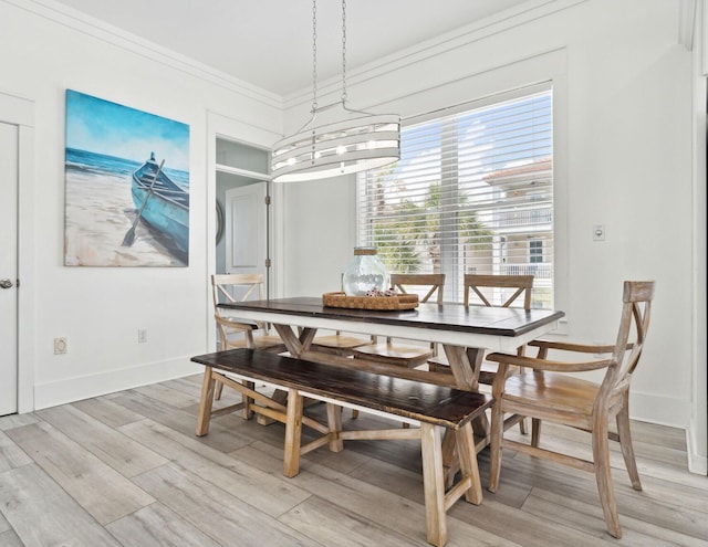 30 Los Angeles St, Miramar Beach, FL 32550 - dining space featuring light wood-type flooring and ornamental molding