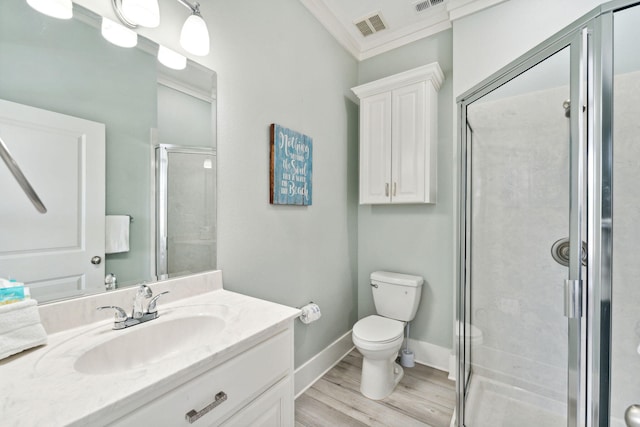 30 Los Angeles St, Miramar Beach, FL 32550 - bathroom with vanity, a stall shower, wood finished floors, and crown molding