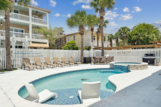 30 Los Angeles St, Miramar Beach, FL 32550 - view of pool with a grill, a patio, a pool with connected hot tub, ceiling fan, and outdoor dining space