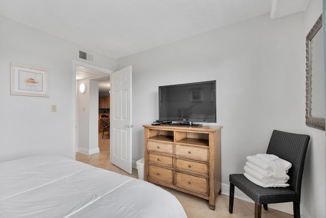885 Santa Rosa Blvd Unit 208, Fort Walton Beach, FL 32548 - bedroom featuring light tile patterned flooring and baseboards