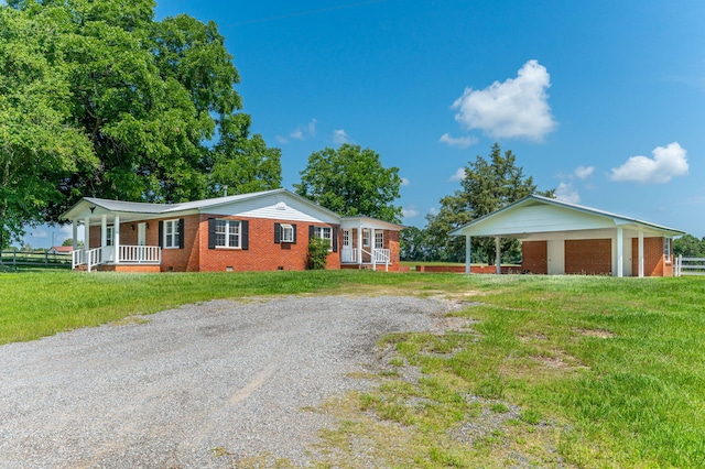 942 Varnum Rd, Laurel Hill, FL 32567 - ranch-style house featuring brick siding, crawl space, driveway, a front lawn, and covered porch