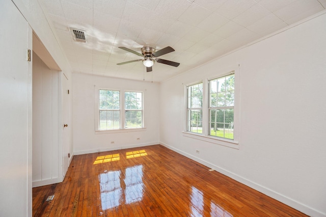 942 Varnum Rd, Laurel Hill, FL 32567 - empty room with wood-type flooring and ceiling fan