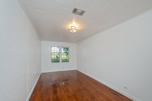 942 Varnum Rd, Laurel Hill, FL 32567 - spare room with hardwood / wood-style floors and baseboards