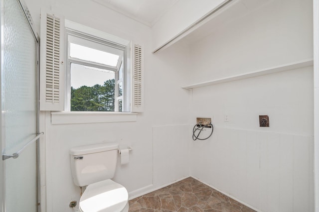 942 Varnum Rd, Laurel Hill, FL 32567 - bathroom featuring a shower with shower door and ornamental molding