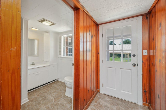 942 Varnum Rd, Laurel Hill, FL 32567 - bathroom with vanity and wood walls