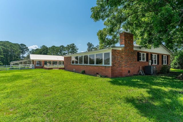 942 Varnum Rd, Laurel Hill, FL 32567 - rear view of property featuring brick siding, a chimney, and crawl space
