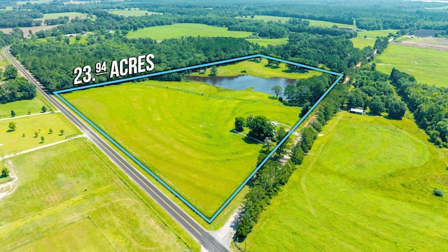 942 Varnum Rd, Laurel Hill, FL 32567 - overview of rural landscape featuring property parcel outlined and a nearby body of water