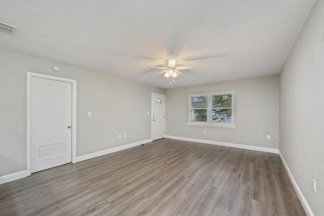 613 Colonial Dr Apt 5, Fort Walton Beach, FL 32547 - unfurnished room with a ceiling fan and wood finished floors