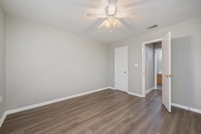 613 Colonial Dr Apt 5, Fort Walton Beach, FL 32547 - unfurnished bedroom featuring wood finished floors and a ceiling fan