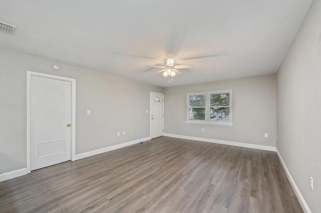 613 Colonial Dr Apt 5, Fort Walton Beach, FL 32547 - empty room featuring a ceiling fan and wood finished floors