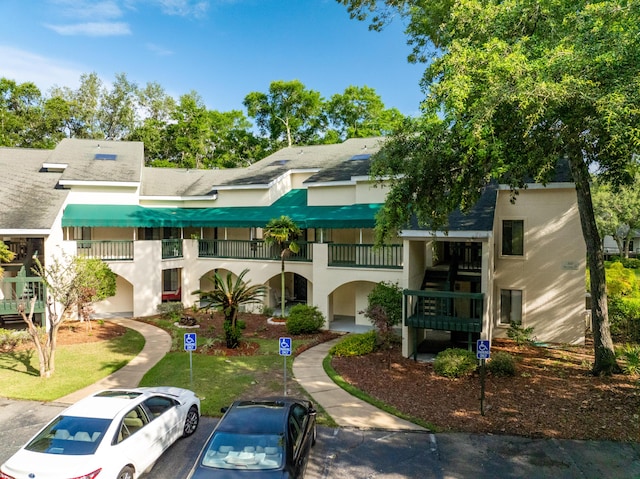 310 Westlake Ct Unit 310, Niceville, FL 32578 - view of property with uncovered parking