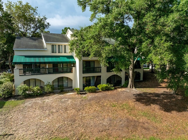 310 Westlake Ct Unit 310, Niceville, FL 32578 - back of house with a balcony