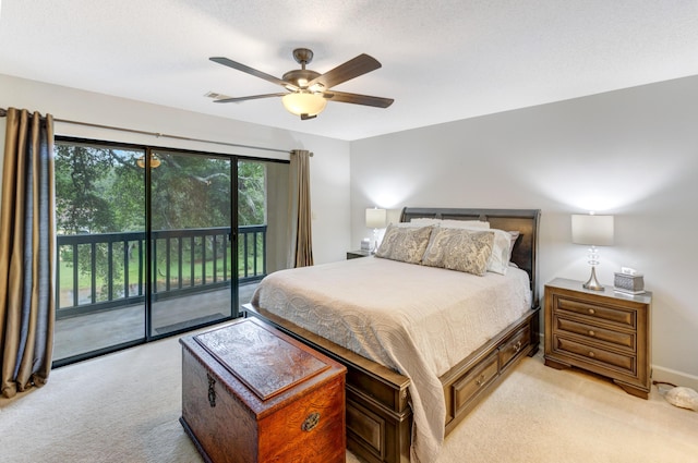 310 Westlake Ct Unit 310, Niceville, FL 32578 - bedroom with light colored carpet, access to outside, and a ceiling fan