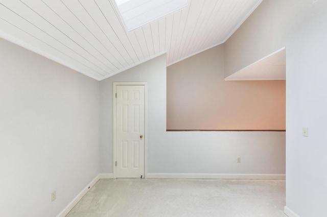 310 Westlake Ct Unit 310, Niceville, FL 32578 - spare room featuring vaulted ceiling, carpet flooring, and wood ceiling