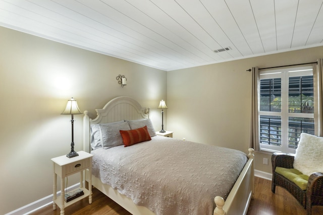 310 Westlake Ct Unit 310, Niceville, FL 32578 - bedroom with dark wood-type flooring and wooden ceiling