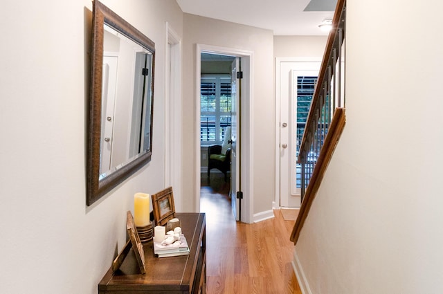 310 Westlake Ct Unit 310, Niceville, FL 32578 - hall featuring light wood-style flooring and stairway