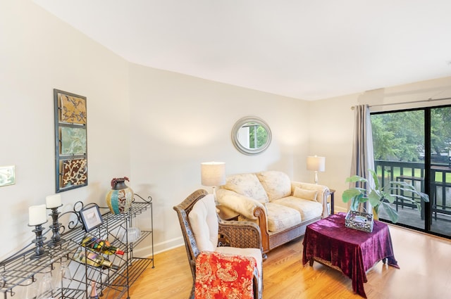 310 Westlake Ct Unit 310, Niceville, FL 32578 - living area featuring healthy amount of natural light and wood finished floors