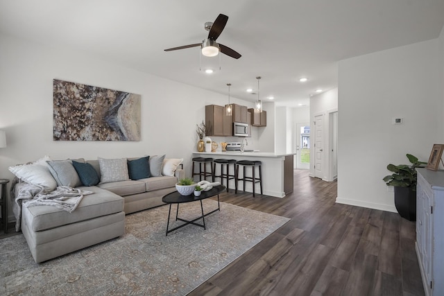 5862 Tyndall Pl, Panama City, FL 32404 - living area with dark wood finished floors, a ceiling fan, and recessed lighting