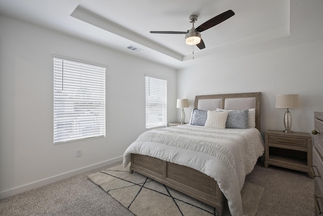 5862 Tyndall Pl, Panama City, FL 32404 - carpeted bedroom featuring a raised ceiling and a ceiling fan