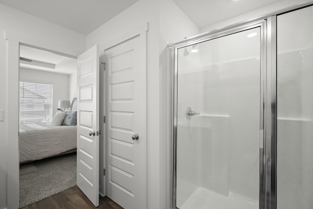 5862 Tyndall Pl, Panama City, FL 32404 - ensuite bathroom featuring wood finished floors and a stall shower