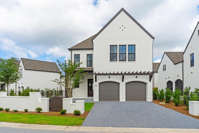 368 Ridgewalk Cir Lot 44B, Santa Rosa Beach, FL 32459 - view of front facade with a gate, decorative driveway, a garage, and brick siding