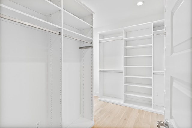 368 Ridgewalk Cir Lot 44B, Santa Rosa Beach, FL 32459 - walk in closet with wood finished floors