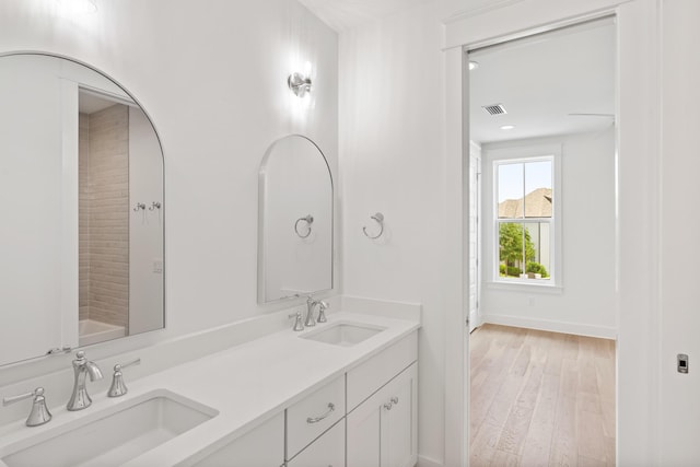 368 Ridgewalk Cir Lot 44B, Santa Rosa Beach, FL 32459 - full bathroom with double vanity and wood finished floors