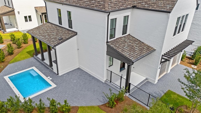 368 Ridgewalk Cir Lot 44B, Santa Rosa Beach, FL 32459 - back of property with a high end roof, a patio, and a garage
