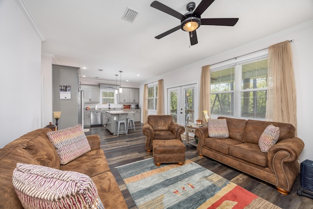 158 Johns Ln, Freeport, FL 32439 - living area featuring dark wood-style flooring, french doors, crown molding, a ceiling fan, and recessed lighting