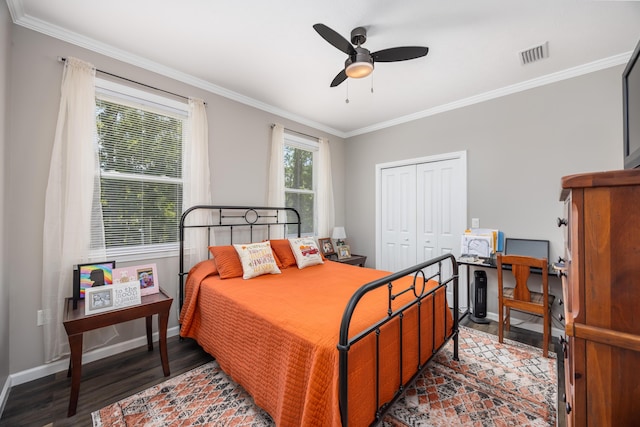 158 Johns Ln, Freeport, FL 32439 - bedroom with ornamental molding, wood finished floors, a closet, and ceiling fan