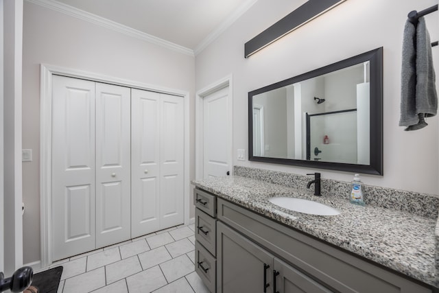 158 Johns Ln, Freeport, FL 32439 - bathroom featuring a closet, ornamental molding, vanity, and a shower with door