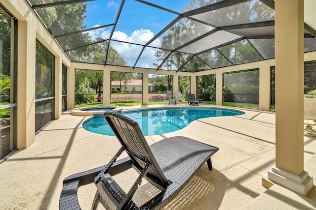 423 Maritime Ct, Destin, FL 32541 - view of swimming pool featuring a patio area, a pool with connected hot tub, and a lanai