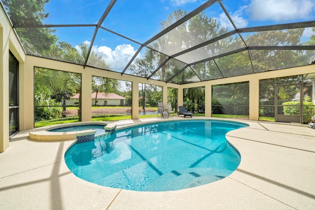 423 Maritime Ct, Destin, FL 32541 - view of pool featuring a pool with connected hot tub, a patio area, and glass enclosure