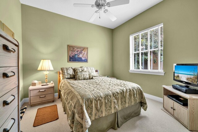 423 Maritime Ct, Destin, FL 32541 - bedroom featuring light colored carpet and a ceiling fan