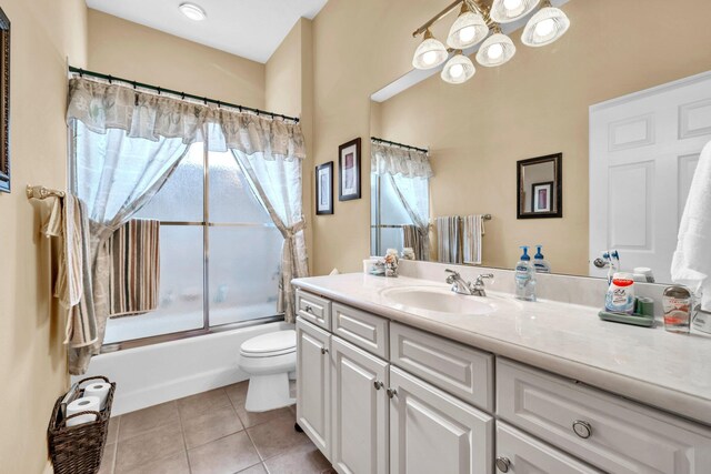 423 Maritime Ct, Destin, FL 32541 - full bath with a chandelier, vanity, tile patterned flooring, and shower / tub combination