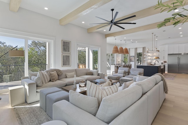 185 Dune Dr, Santa Rosa Beach, FL 32459 - living room featuring beamed ceiling, plenty of natural light, recessed lighting, ceiling fan, and light wood finished floors