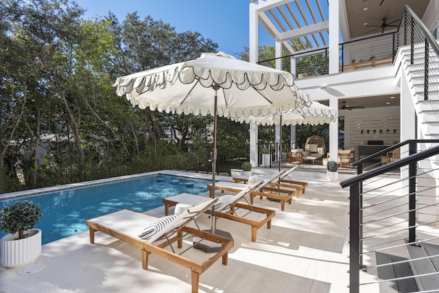 185 Dune Dr, Santa Rosa Beach, FL 32459 - outdoor pool featuring ceiling fan, stairs, and a patio area