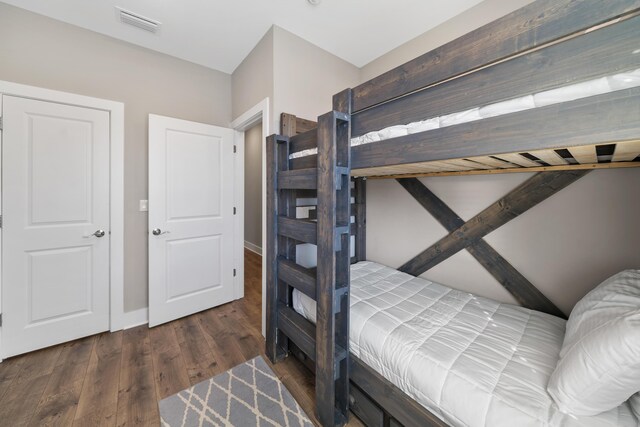 173 W Willow Mist Rd, Inlet Beach, FL 32461 - bedroom featuring wood finished floors and baseboards