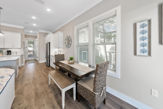 173 W Willow Mist Rd, Inlet Beach, FL 32461 - dining area featuring ornamental molding, wood finished floors, and recessed lighting