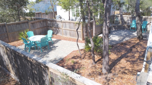 173 W Willow Mist Rd, Inlet Beach, FL 32461 - fenced backyard with a patio