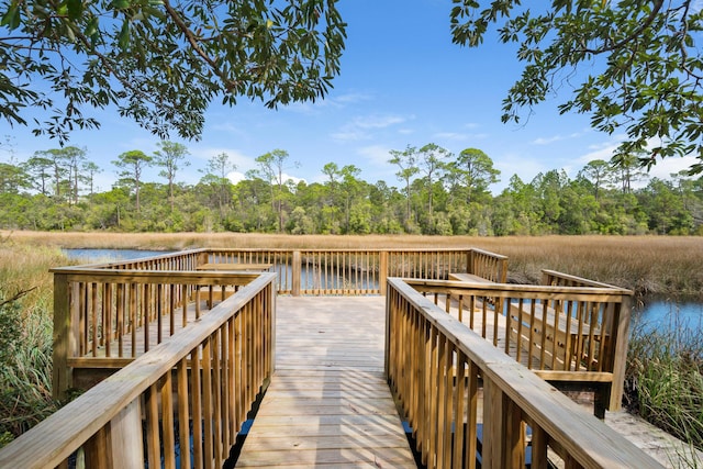 173 W Willow Mist Rd, Inlet Beach, FL 32461 - dock featuring a deck with water view and a wooded view