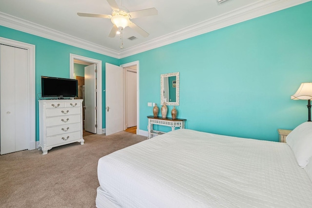 19108 Front Beach Rd Unit B, Panama City Beach, FL 32413 - bedroom with carpet floors, ornamental molding, a ceiling fan, and a closet